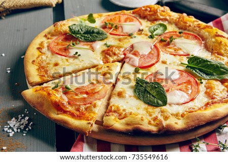 Italian Pizza Restaurant Menu - Classic Margarita Pizza. Pizza Dinner Royalty-Free Stock Photo #735549616