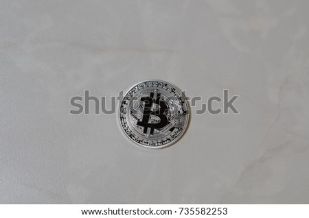 Silver bitcoin on a white background