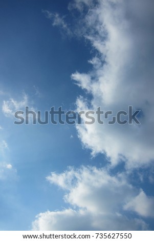 vertical fluffy clouds