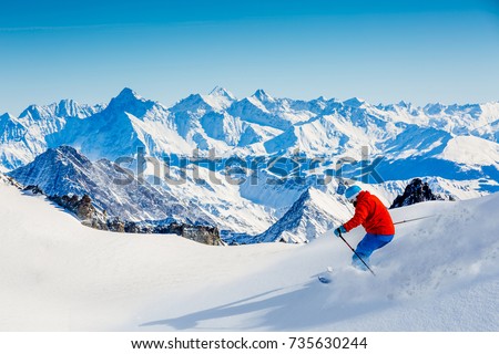 Skiing Vallee Blanche Chamonix with amazing panorama of Grandes Jorasses and Dent du Geant from Aiguille du Midi, Mont Blanc mountain, Haute-Savoie, France Royalty-Free Stock Photo #735630244