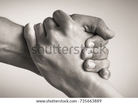 Give a helping hand. Unity, salvation. Royalty-Free Stock Photo #735663889