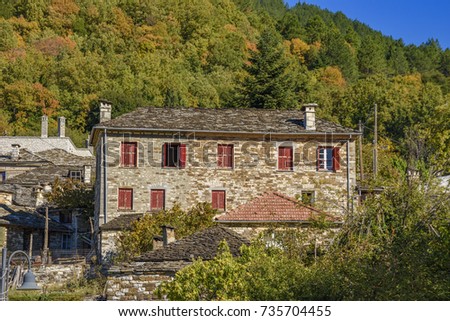 Architectural buildings in the famous Papigo village in Epirus, Greece. Papigo is a cozy, neat and tidy village with numerous beautiful pictures. It has become a popular and touristic place in Greece.