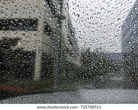 Drops of rain on glass, closeup