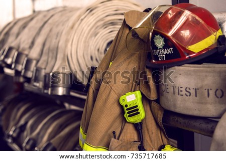 Firefighter hoses and helmet