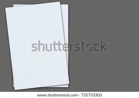 Blank sheet of paper on gray background with clipping path.