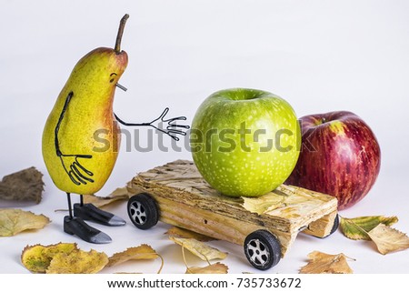 pear in the image of a man harvesting apples to the cart