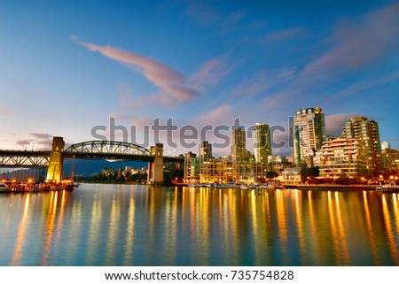 Beautiful view of Vancouver BC with harbor at sunset, Canada