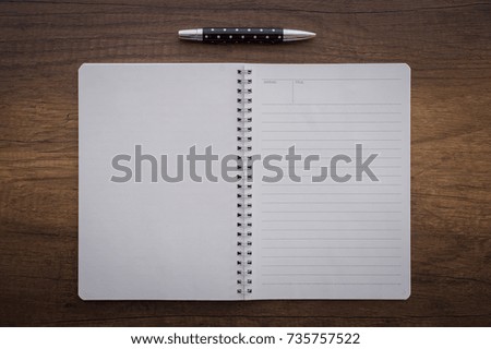 Picture for Business, Open notebook, Blank notebook Folding on Wooden Background with pen