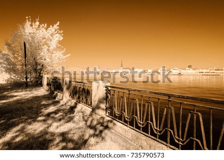 panoramic view of Riga, Latvia over the river Daugava in sunny day. autumn colors. infrared image