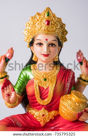 Beautiful Clay Idol of Hindu Goddess Lakshmi OR Laxmi, selective focus

