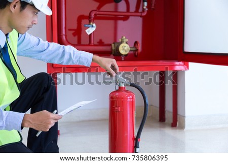 Engineer inspection Fire extinguisher and fire hose.
