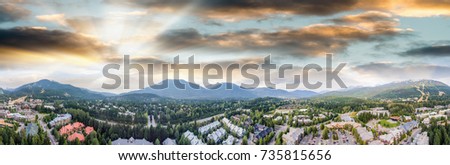 Panoramic aerial view of Whistler skyline and surrounding mountain scenario in summer.