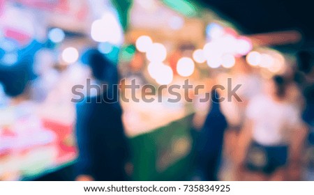 Image of Abstract Blur Food Stall at street night market with bokeh for background usage .(vintage tone)
