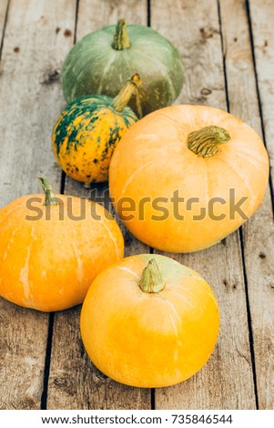 Autumn. Pumpkin Thanksgiving Background, vintage chalkboard - orange pumpkins on wooden table, halloween, holiday decoration.