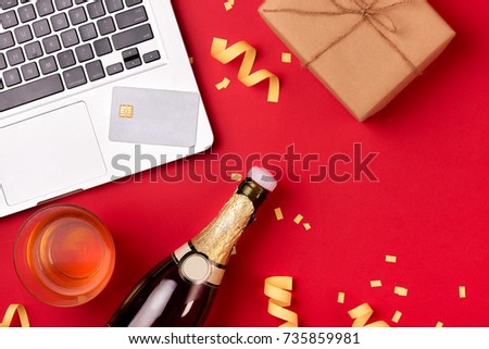 Gift box and birthday party things on a red background