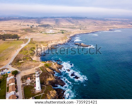 Stunning aerial views of the Pacific ocean cliffs, beach and the Lighthouse in California, San Andreas. 