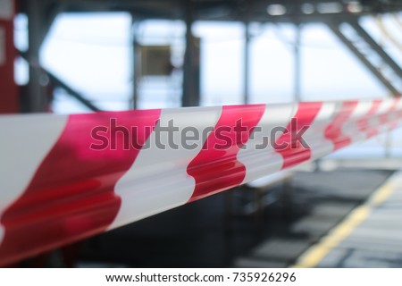 White and red strip barrier tape Royalty-Free Stock Photo #735926296