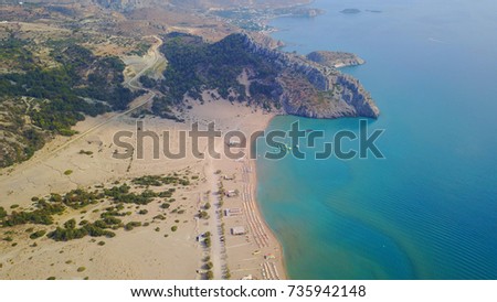 Aerial birds eye view photo taken by drone of famous beach of Tsampika and church uphill overlooking the beach, Rhodes island, Dodecanese, Greece