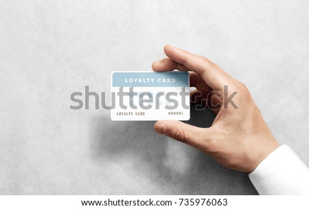 Hand hold discount card template with rounded corners. Plain reward namecard mock up holding arm. Plastic loyalty program mockup with points display. Gift offset card design. Loyal service branding. Royalty-Free Stock Photo #735976063