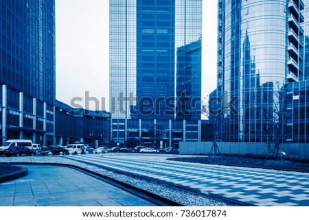 empty square and city skyline under blue sky,tianjin city,china.