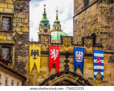 Medieval flags of Old Town bridge tower, Charles Bridge, Prague, Czech Republic  