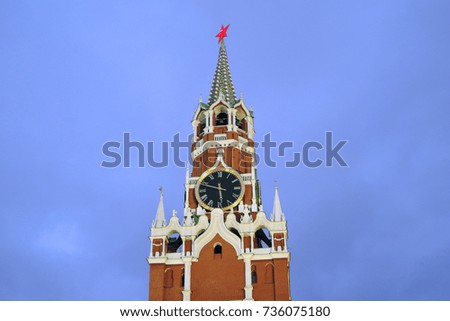 Moscow Kremlin tower. Color photo. Blue sky background.