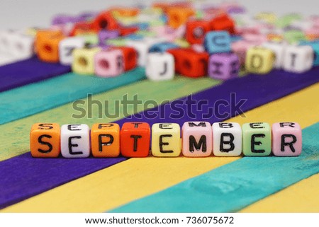 Colorful beads letter for months of the year concept - SEPTEMBER.