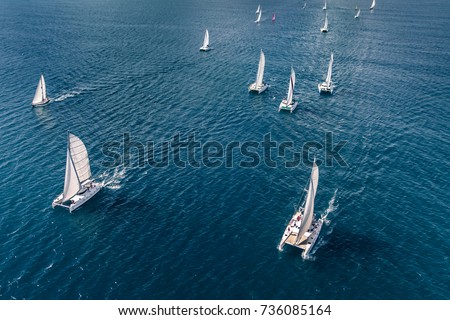 Regatta in the Indian Ocean, monohulls and catamarans Royalty-Free Stock Photo #736085164