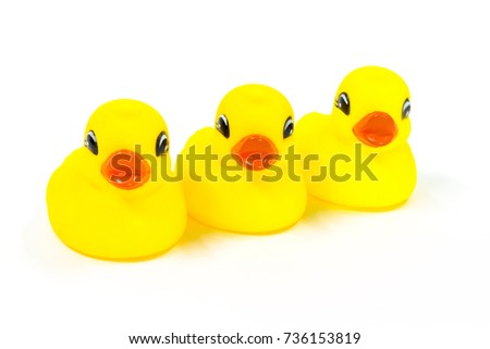 Three of Yellow rubber duck toy on white background, isolated.