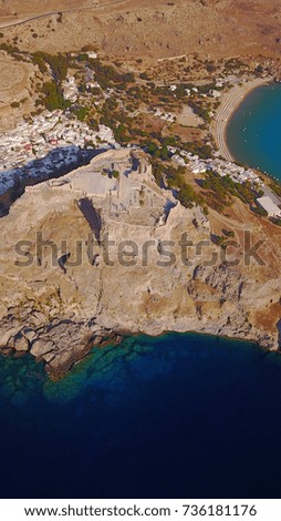Aerial birds eye view photo taken by drone of iconic Acropolis of village of Lindos, Rhodes island, Dodecanese, Greece