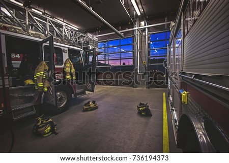 Firehouse between calls Royalty-Free Stock Photo #736194373