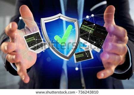 View of a Shield symbol surrounded by devices and network displayed on a futuristic interface 