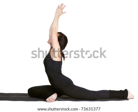 full-length portrait of beautiful woman working out yoga excercises on fitness mat