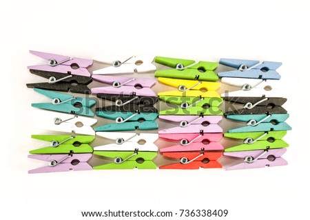 Photo picture of multicolored clothespin background texture