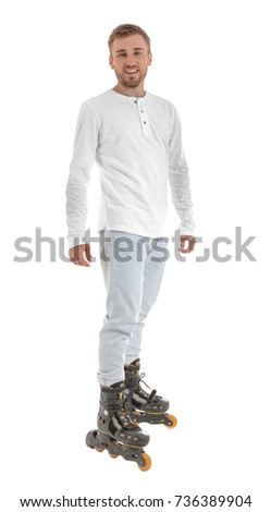 Man on roller skates against white background
