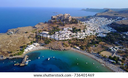 Aerial birds eye view photo taken by drone of iconic Acropolis of village of Lindos, Rhodes island, Dodecanese, Greece