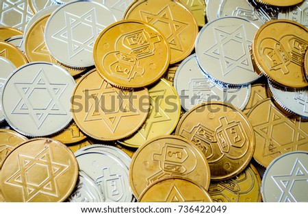 background texture full frame close up of colorful Hanukkah coins