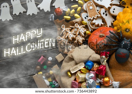 Happy Halloween card. Funny delicious ginger cookie shape ghost and skeleton, bag of sweets and candies with pumpkins and sweets.