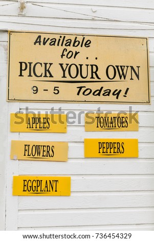 "Pick your own"  sign at a farm