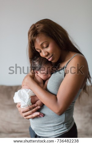 African American mother with baby Royalty-Free Stock Photo #736482238