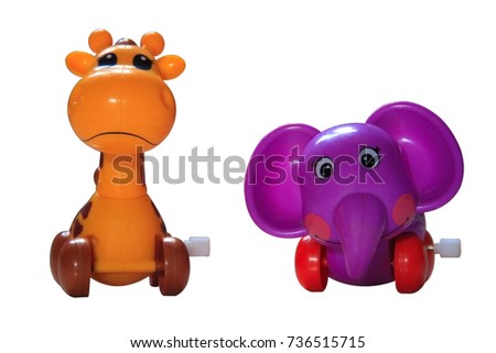 Giraffe and Elephant, Plastic Toy Animal isolated on white background.