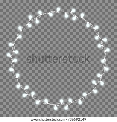 Christmas tree string garland in circle shape and text space isolated on background. Realistic Christmas, New Year party decorations with transparency. Light bulb decor. Lights border. Royalty-Free Stock Photo #736592149