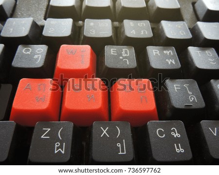 selective focus image,English and Thai alphabets keyboard black color with have red buttons Included.                    