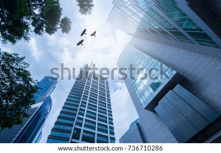 Modern office corporate building. Low angle view of skyscrapers in city of Singapore .Panoramic and perspective view Business concept of success industry tech architecture.