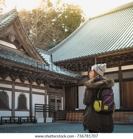 Women are shocked by the beauty beyond the narrative of a shrine in matsushima. In the midst of winter