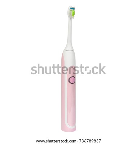 Pink electronic ultrasonic toothbrush isolated on a white background