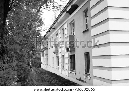 Old building with a balcony in the Russia town, autumn