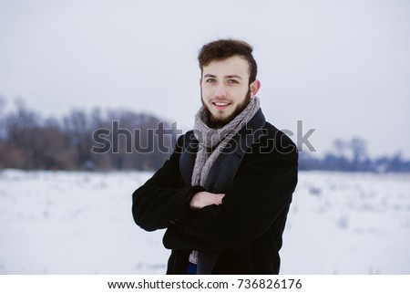 young guy in winter coat