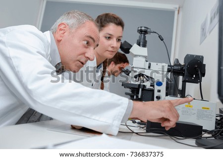 scientists in laboratory