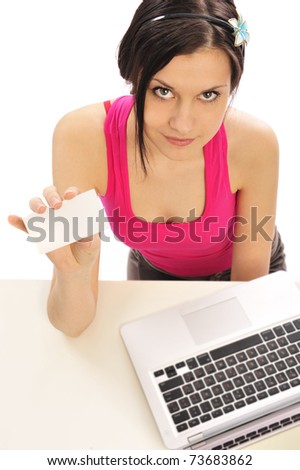 Closeup portrait of young entrepreneur woman wearing casual clothes giving business card, smiling at her office